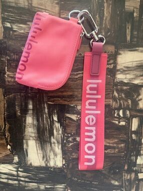 Never used lululemon athletica Pink Wristlet Card Holder with Logo Strap